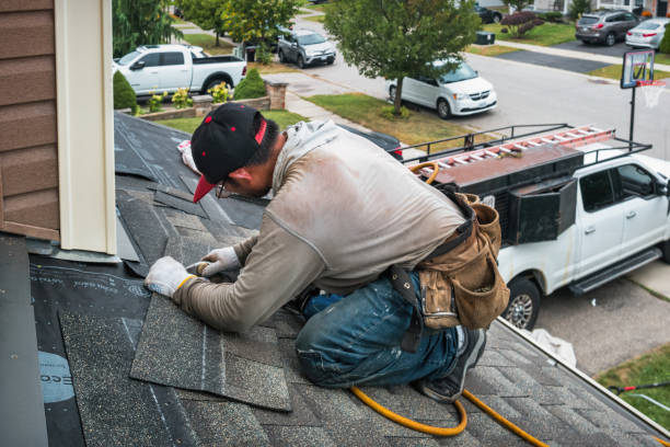 Professional Gutter Repair And Installation technician working in Boynton Beach, FL